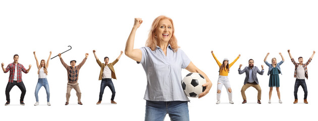 Woman holding a football and people cheering in the back