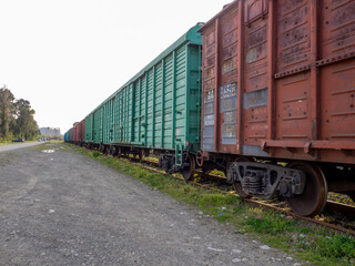 Obraz premium Old freight wagons on the tracks. Railway Trucking industry.