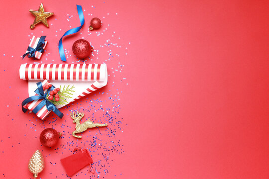 Wallpaper greeting card Merry Christmas holiday composition with striped gift box present decoration on background. Xmas New Year winter design idea concept. Copy space for text. Top view, Flat lay.