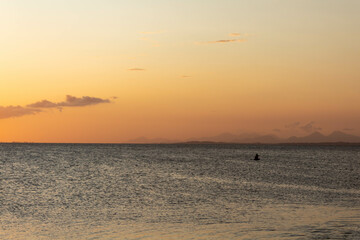 sunset on the beach, dusk with sea and sand
