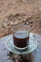 black coffee on a wooden table