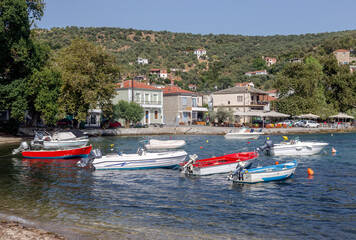 Obraz premium View of the embankment and boats in a summer, sunny evening