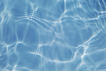 Bluewater waves on the surface ripples blurred. Defocus blurred transparent blue colored clear calm...