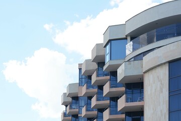 Beautiful building with balconies against sky, low angle view