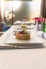 Raw salmon with avocado served in the restaurant