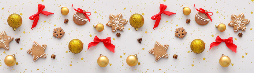 Composition with Christmas balls and cookies on light background