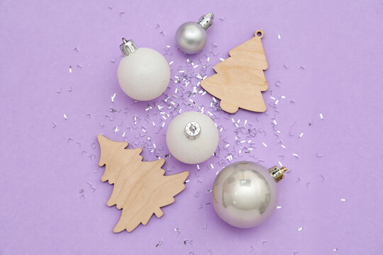 Beautiful Christmas decorations on lilac background