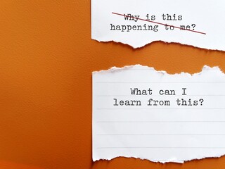 Torn paper on orange background with handwriting WHY THIS HAPPENING TO ME?, changed to WHAT CAN I...