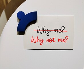 Card on magnetic board with handwritten text WHY ME? replaced with WHY NOT ME? - overcome...
