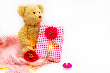 teddy bear holding gift box for festival christmas ,new year and special day decoration postcard style on background white