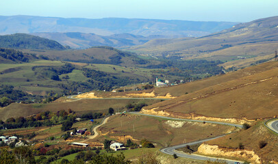 Naklejka premium Mountain roads in autumn in the Caucasus