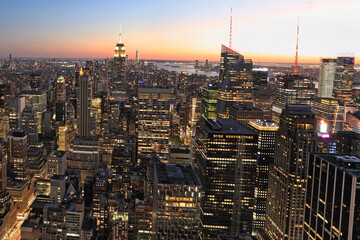 New York City skyline illuminated at dusk, USA