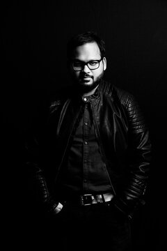 Middle age beard Indian Man posing for the camera