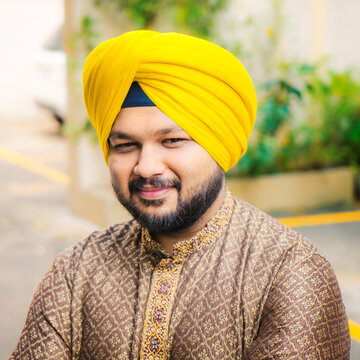 Middle age beard Indian Man posing for the camera