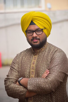 Middle age beard Indian Man posing for the camera