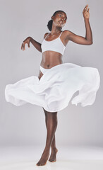 Woman, dance and art of a black woman looking elegant dancing with body health, wellness and...