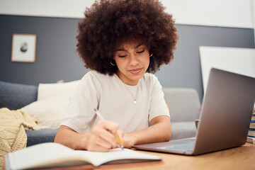 Planning, study and laptop with black woman writing in notebook for schedule, e learning and...