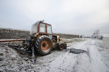 November, 2022 - Arkhangelsk. An old rusty tractor against the backdrop of a bastion fortress. Russia, Novodvinsk fortressArkhangelsk, Old, rusty, tractor, bastion fortress, Russia, Novodvinsk fortres