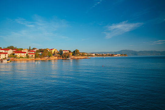 Town of Malinska waterfront aerial view, Island of Krk tourist destination in Croatia