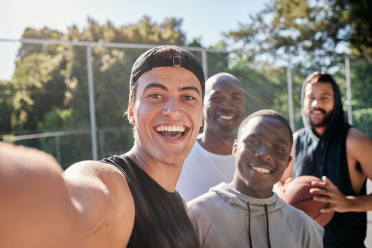 Selfie, basketball and team on a sports court for partnership, collaboration and training together with picture. Happy, young and athlete group with a photo for social media after fitness exercise