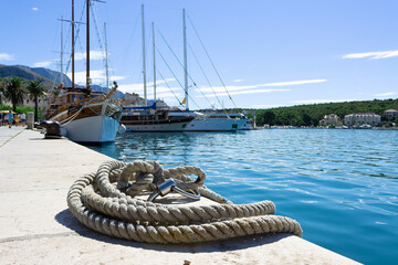 A bunch of ropes on the quay wall in the port of Makarska (Adriatic Sea), Dalmatia, Croatia. 