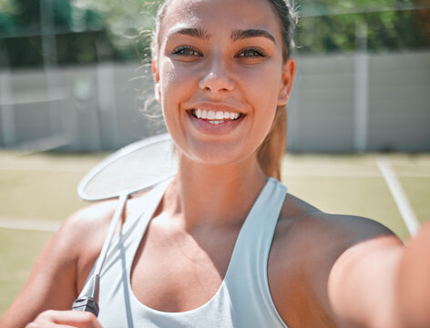 Woman, athlete with tennis selfie for fitness outdoor on tennis court, happy in picture and ready for sport game. Sports, smile with tennis racket and active lifestyle, healthy and exercise portrait.
