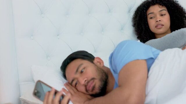 Couple, phone or cheating in house bedroom, home or hotel on social media, online dating app or sexting. Spying, curious woman or checking mobile technology on asian man affair or infidelity betrayal