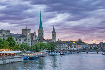 Fototapeta na wymiar Zurich twilight cityscape and Limmat river in Zurich city center
