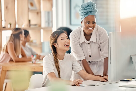 Diversity, Help Or Training At Computer In Web Design Company Office Brainstorming Idea With Smile. Asian, Black Woman And Interracial Webdesign Employees Working On Ux Project In Workplace.