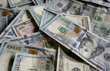 One Hundred Dollars banknotes. Official currency of the United States of America. 100 USD notes, American US dollar paper bills obverse.