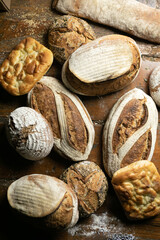 Artisan breads on a wooden table