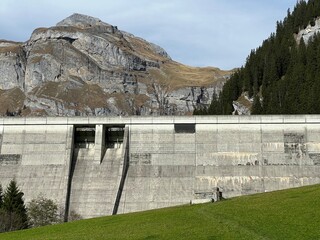 The dam Panixer or concrete dam on the reservoir lake Panixersee (Lag da Pigniu) on the slopes of...