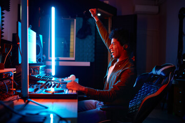 Emotional music sound producer at workplace