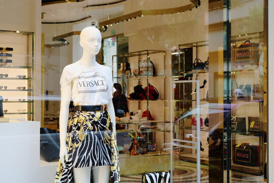TOKYO, JAPAN - June 28, 2019: A mannequin in the window of a branch of Versace in Ginza. 