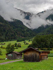 Fototapeta na wymiar Solden, Austria - July 26, 2022: A rainy and cloudy summer day in the Otztal valley, near Solden
