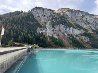 Obraz na płótnie Canvas The reservoir lake Panixersee (Lag da Pigniu) or Panixer Lake on the slopes of the Glarus Alps mountain massif, Pigniu-Panix - Canton of Grisons, Switzerland (Kanton Graubünden, Schweiz)
