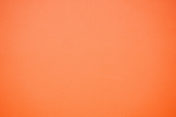 Texture of orange color leather sheet 