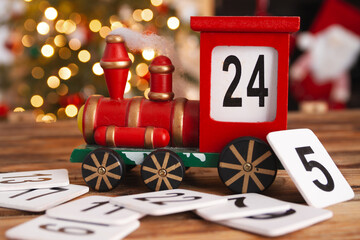 Wooden train Christmas advent calendar. Countdown to Christmas festive decoration. Counting down...