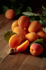 Apricots on a wooden table.