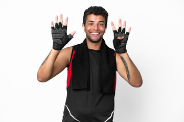 Sport brazilian man with towel isolated on white background counting nine with fingers