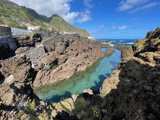The natural volcanic lagoon pools for swimming in Porto Moniz, Madeira island, Portugal