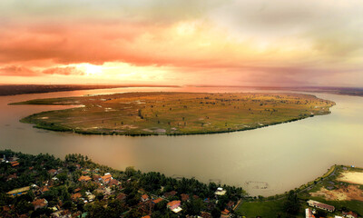 Burning Sunset in Batticaloa, Sri Lanka. small island on lagoon with a beautiful sunset. Taken from more than 150m height with a Drone. © Geeth Mendis