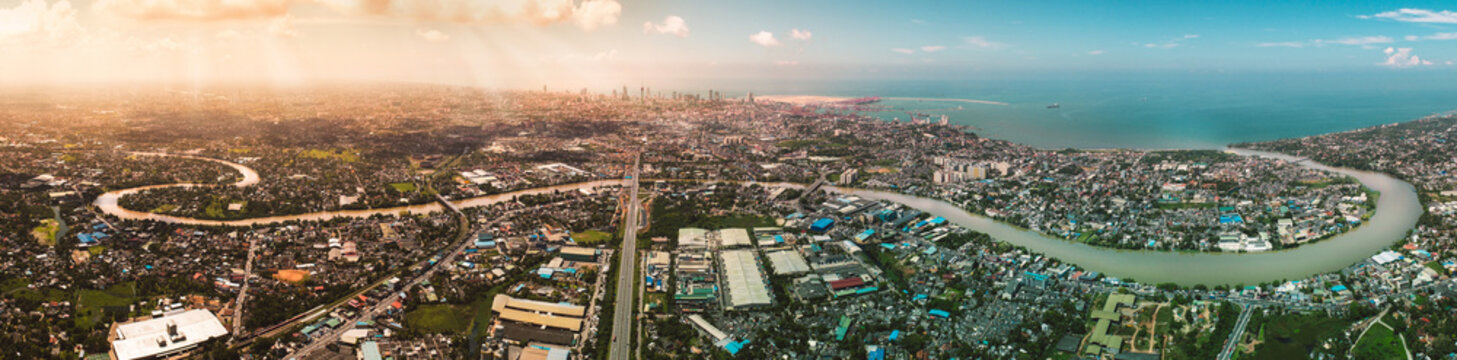 Colombo Skyline, the capital city of Sri Lanka. 
Four images merged to create this beautiful Colombo skyline panorama photo. On this photo you will see Kelani River, E03 Express way and beautiful city