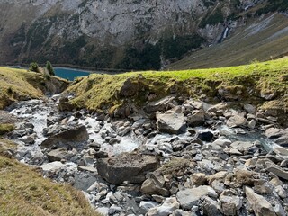 Aua dil Mer stream or Aua dil Mer creek (Aua dil Mer Bach) over the lake Panixersee (Lag da Pigniu) and in the Glarus Alps massif, Pigniu-Panix - Canton of Grisons, Switzerland (Kanton Graubünden)