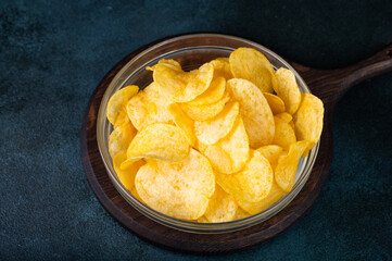 Potato chips. Traditional beer snacks. Fried potato. Unhealthy food