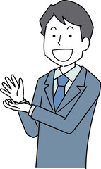 紹介するポーズの男性