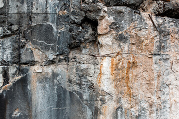 Texture of damaged concrete with iron fitting on pre second world war bunker in Czech Republic. 
