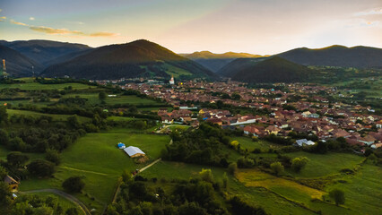 Village in the forest by drone point of view, Romania, Transylvania