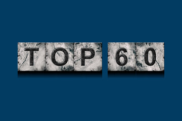 Top 60, words, above different numbers, on a dark blue background. Alphabet on stone blocks.Rating. Rating concept.