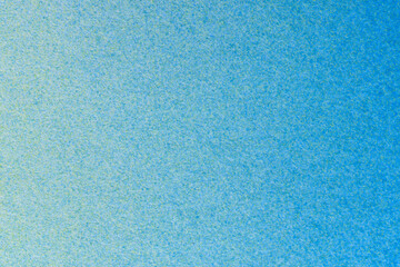 macro photography blue and yellow spray paint on white paper